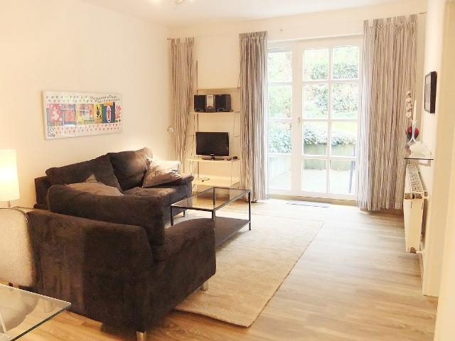 Schöne Souterrainwohnung mit Terrasse in Ruhiger Lage – zeitwohnen.de