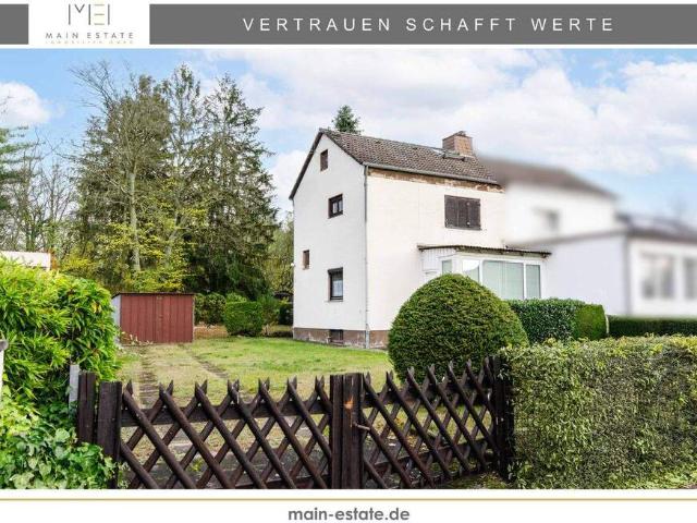 Sanierungsbedürftige Doppelhaushälfte mit weitläufigem Garten und Ausbaupotenzial