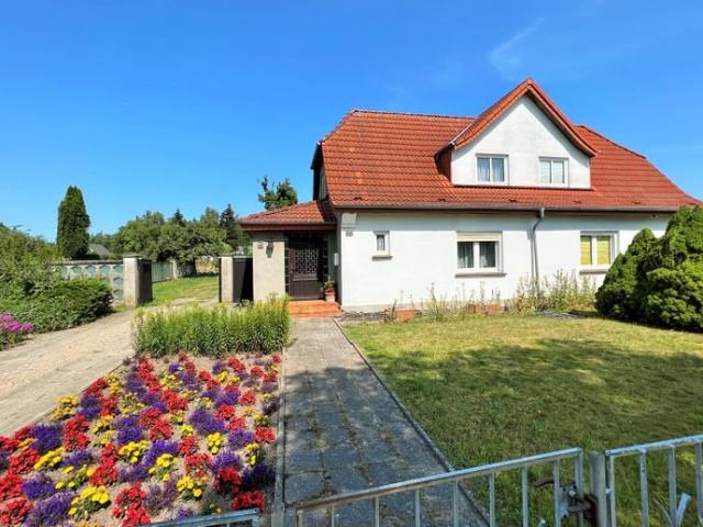 sanierungsbedürftige erweiterbare Doppelhaushälfte in Stadtweide mit 4,5 Zimmern, Garage, Keller