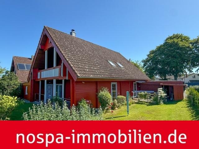 Sackgassenendlage! Gepflegtes Holzhaus mit Garage, Carport, 2 Terrassen und Loggia