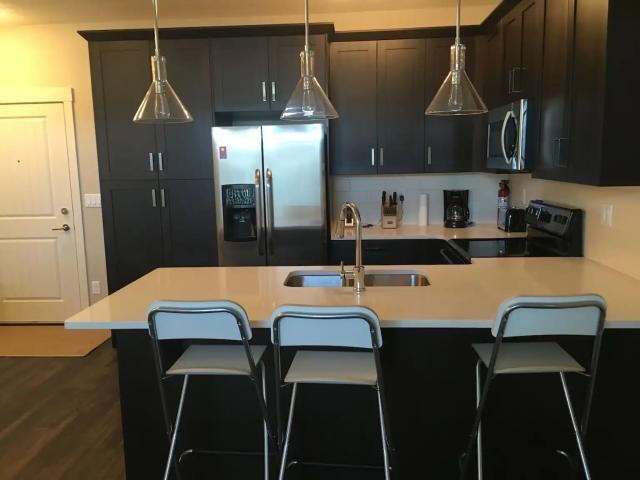 SAGE CONDO UNIT with 2 Parking + AC