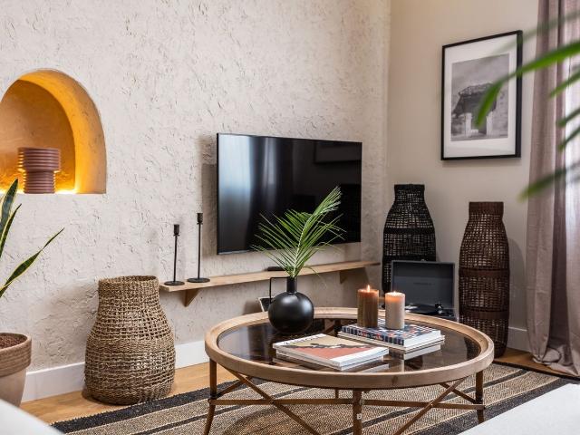 Saharan Inspired 3 Bedroom Flat in Almagro with Dedicated Workspace and Modern Kitchen, Madrid Amsterdam Apartments for Rent