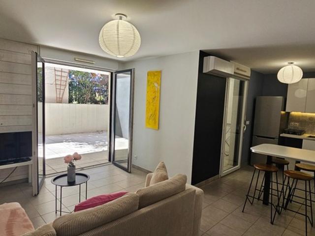 SAINT JEAN DE VEDAS 34 F3 avec grande terrasse et parking en sous sol