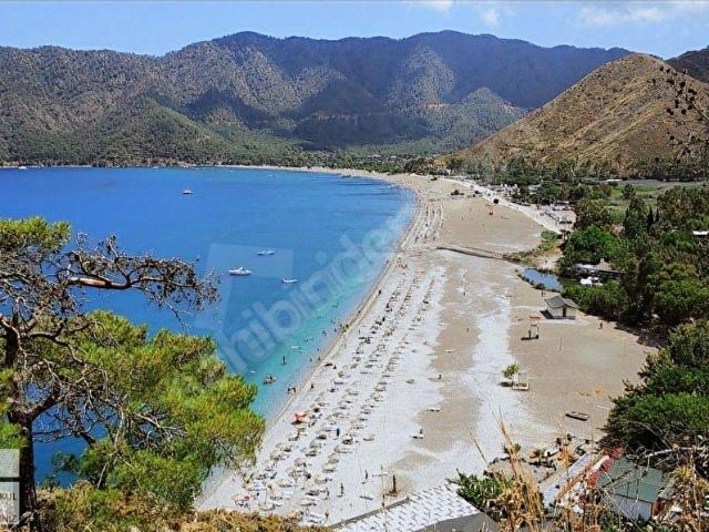 SAKLI CENNET ANTALYA ADRASAN KOYU'NDA 500M2 İMARLI SATILIK ARSA