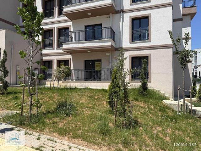 SARIGAZİ TOKİ KONUTLARINDA KÖŞE BAŞI 94 M2 2+1 BAHÇE KATI DAİRE