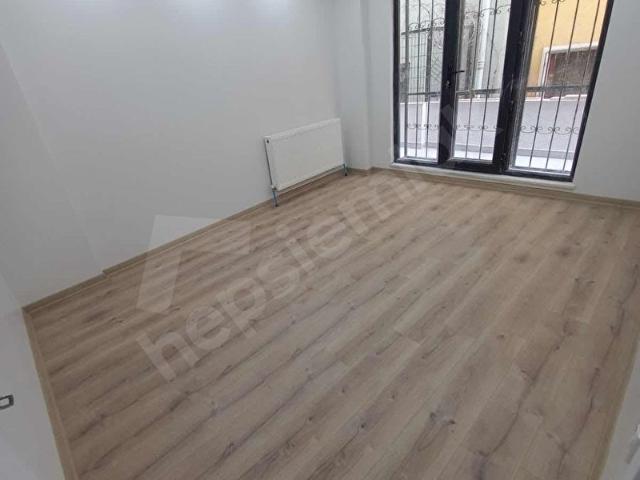 SATILIK SIFIR BİNADA 1+1 60 m2 BALKONLU BAHÇE KAT DAİRE