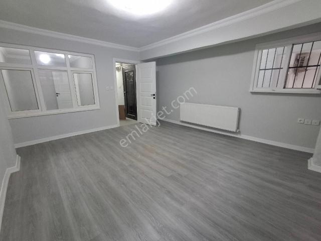 Savaş Emlak'tan Satılık 2+1 Bahçe Kat 100 Metre Oturum Alanı
