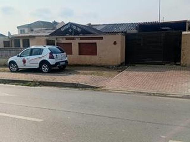 semi detached home with 3 outside ro.