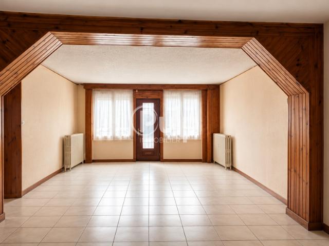 Semi plain pied 4 chambres avec grand jardin et double garage à Carvin
