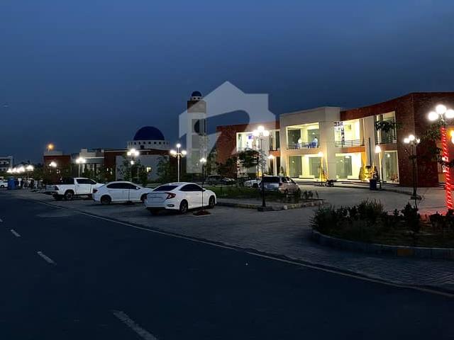 Sector A 1 Kanal Double Road Plot At walking distance to park mosque & market for sale