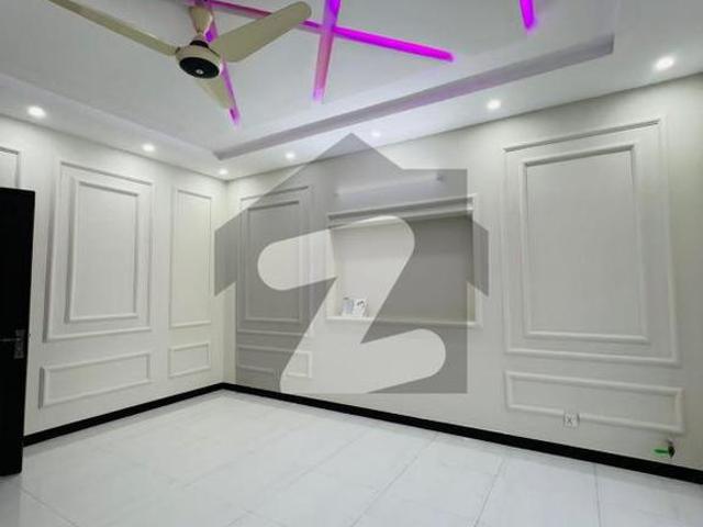 Sector B Owner Built 10 Marla Slightly Used House For Sale with gas solar and 6 mrla lawn space. In Bahria Town Phase 8 Block E
