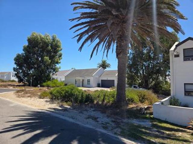 secure coastal estate with modern pl.