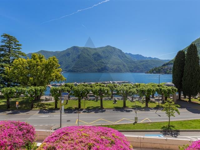 SEERESIDENZ MIT PRIVATGARTEN IM ZENTRUM VON LUGAN