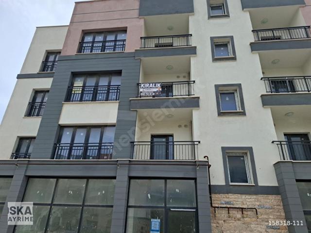SEFERİHİSAR TOKİ'DE KİRALIK ARA KAT 2+1 KAPALI MUTFAKLI DAİRE