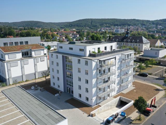 Sofort bezugsfertige Neubau 3 Zimmer Wohnung mit Balkon in attraktiver Stadtrandlage und ausgezeichneter Infrastruktur