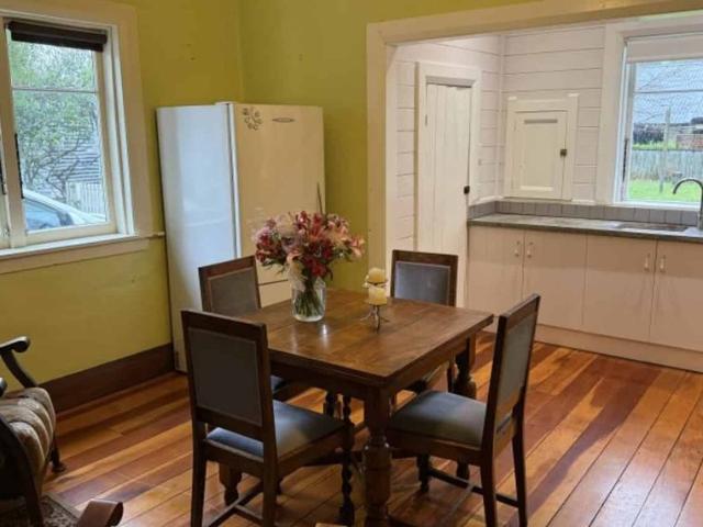 Separate lounge with open plan kitchen and dining