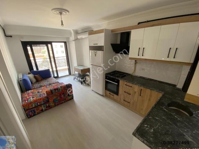 Seyrek De Full Eşyalı Merkeze Yakın Asansörlü 1+1 Satılık Dire
