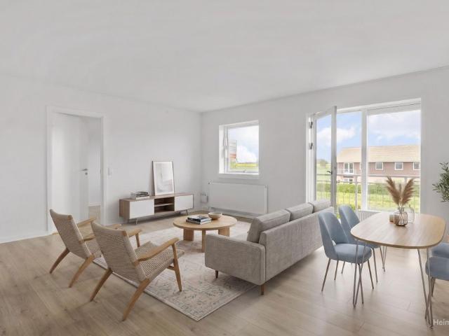 Skøn lejebolig i Odense S med moderniseret køkken og badeværelse samt gratis parkering