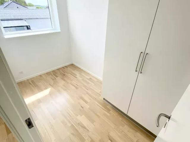 Skøn 4 værelses lejlighed med altan i AstaHus