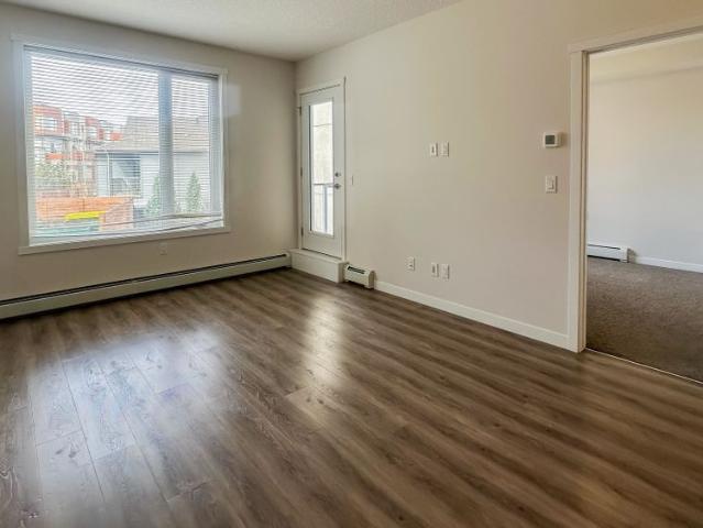 Shawnee Slopes | 2 Bed, 2 Bath Condo | 1 Underground Stall | Storage Locker