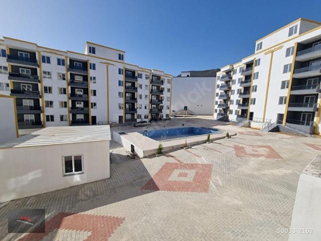 SİLİFKE YEŞİLOVACIKTA SATILIK 1+1 HAVUZLU DAİRE