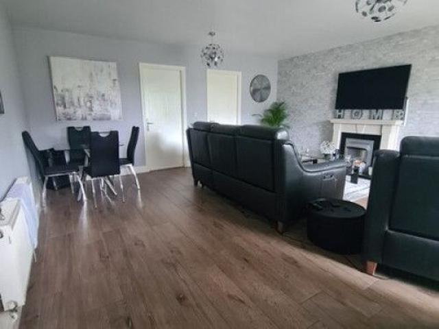 Single bed in large room
