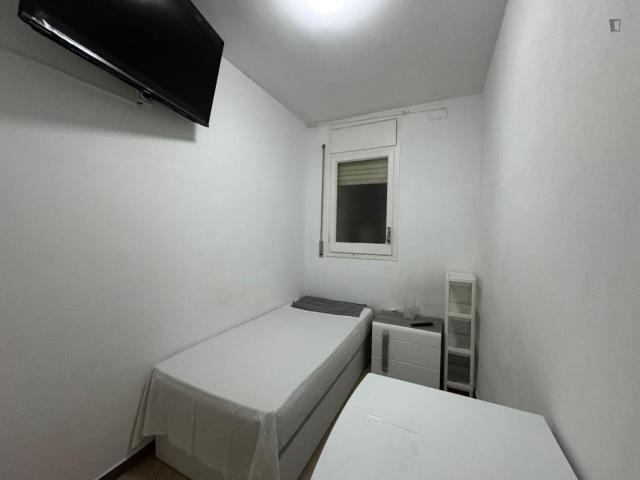 Single bedroom with interior window
