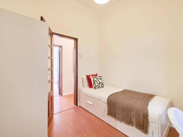 Single Bedroom with private bathroom in a 11 Bedroom Apartment in Rua de Buenos Aires, Lisbon Room 11
