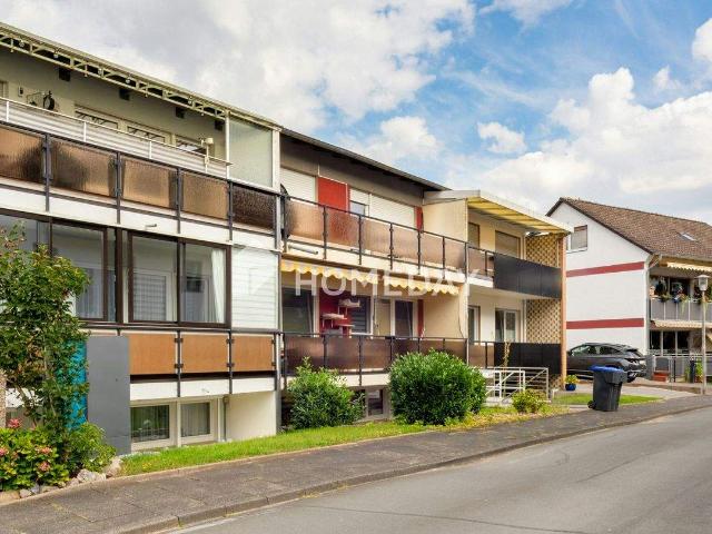 Sicher vermietetes Mehrfamilienhaus mit 3 WEs, Garten, und Balkone in idealer Lage