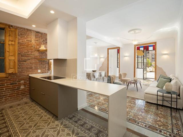Situada en una elegante finca modernista catalogada de la ca. 150m² Barcelona