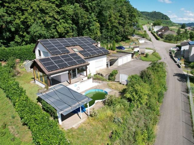 Sonnengeflutetes Einfamilienhaus mit Einliegerwohnung