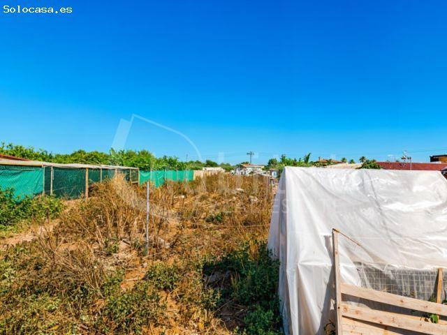 Solar rústico vallado con 1.270 m2 a la venta en Rojales, Alicante