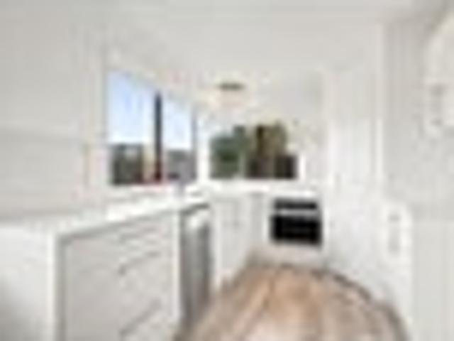 Solid Brick Living Just Steps from the City Centre