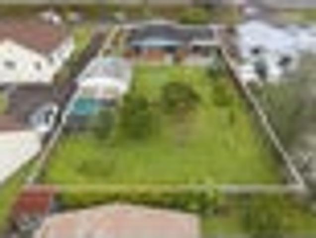 Solid, sunny brick 1970's home on large section