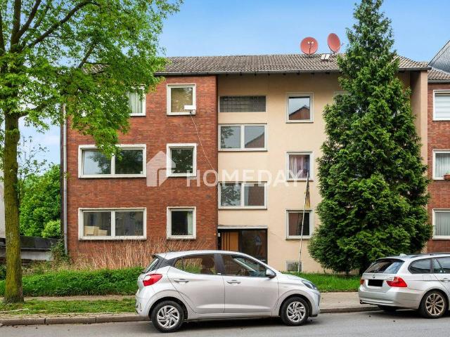 Solide Kapitalanlage Mehrfamilienhaus mit 6 WEs & 10 Garagen mitten in Mühlheim!