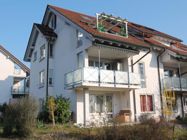 Solide vermietet + viel Potenzial: 3,5 Zi. Wohnung mit Terrasse & Gartenanteil