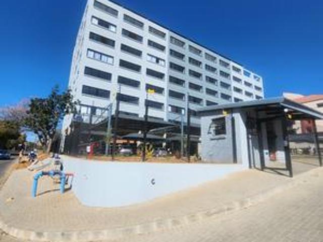 sleek rivonia flat with secure parki.
