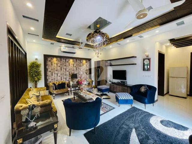 Slightly Used 1 Kanal Modern Luxury Bungalow for Sale in DHA Phase 6 5 Bed Elegant Living, Prime Location, 4 Car Parking & Lush Green Lawn Best Investment Opportunity