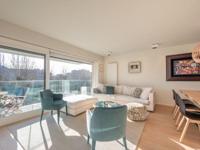 Smaakvol afgewerkt appartement met zuidgericht terras en.