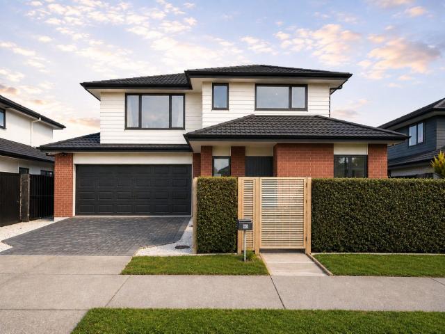 Spacious 4 Bedroom Brick Home with Double internal Garage in Whenuapai $900 Per Week