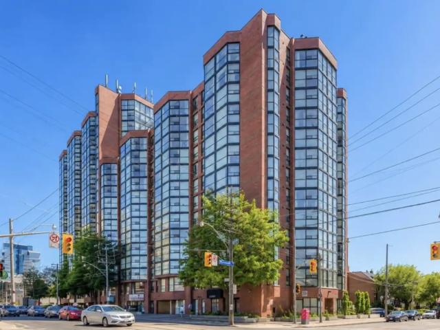 Spacious 1 bed + den parking and locker included at King St W & Bathurst available July 8