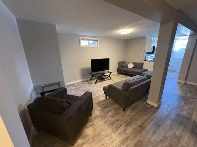 Spacious 1 Bedroom + Den Furnished Basement Suite | Pet Friendly