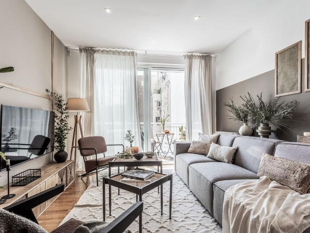 Spacious 2 Bedroom Apartment with Rustic Modern Design, Terrace, and Dedicated Workspace in Salamanca, Madrid Amsterdam Apartments for Rent