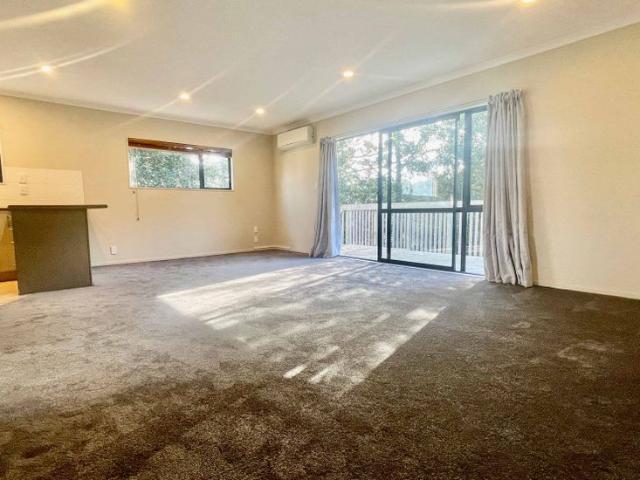 Spacious 2 Bedroom Home with Expansive Decks & Large Garage able to fit 4 cars