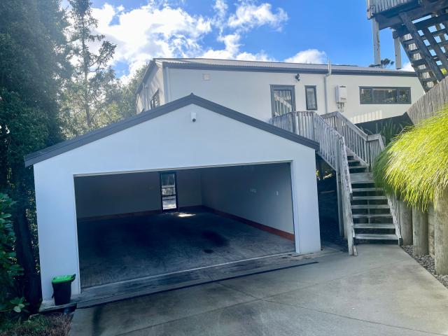 Spacious 2 Bedroom Home with Expansive Decks & Large Garage able to fit 4 cars
