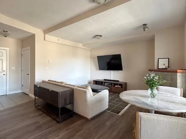 Large 2 Bed + 2 Bath | Concrete Building | 2 Heated Parking Stalls | Walk to LRT