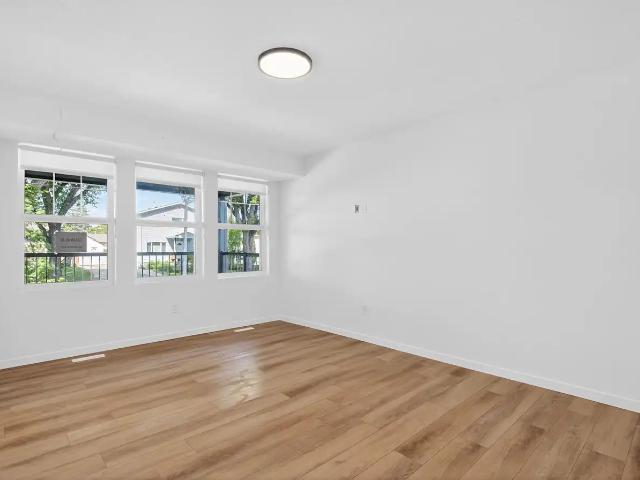 Spacious 3 bed upper with shiplap accented primary and double vanity main bath