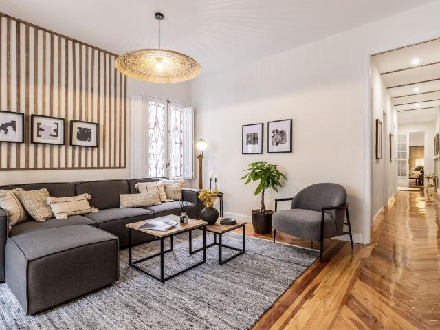 Spacious 3 Bedroom Apartment with Mountain Inspired Design and Private Terrace in Almagro, Madrid Amsterdam Apartments for Rent