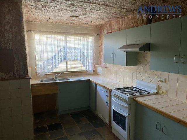 Spacious 3 Bedroom Dugout with Multiple Living Areas