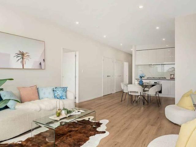Spacious 3 Bedroom Home with Deck & Backyard !